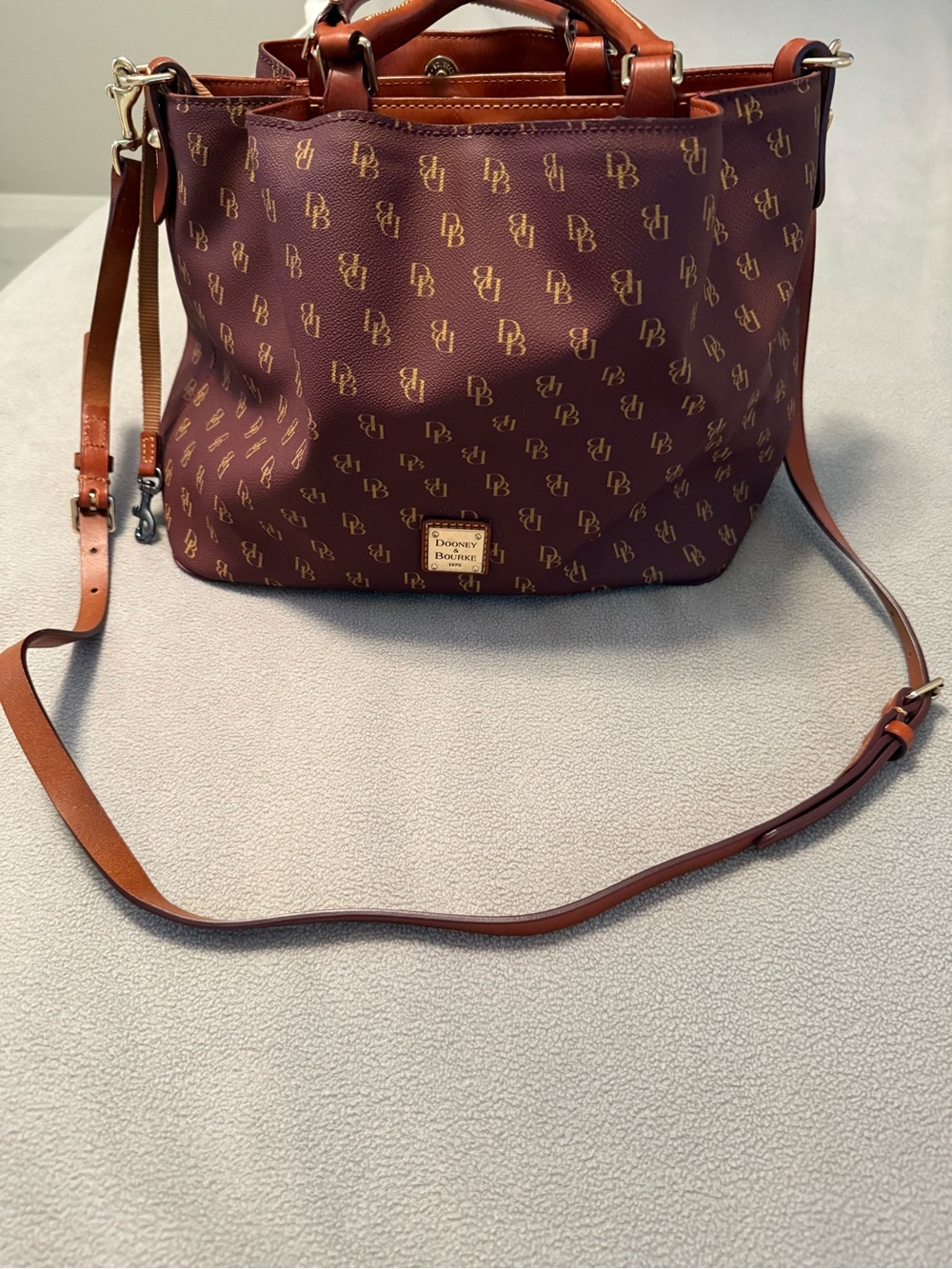 Dooney & Bourke Burgundy Logo Canvas Messenger Bag with Tan Trim
